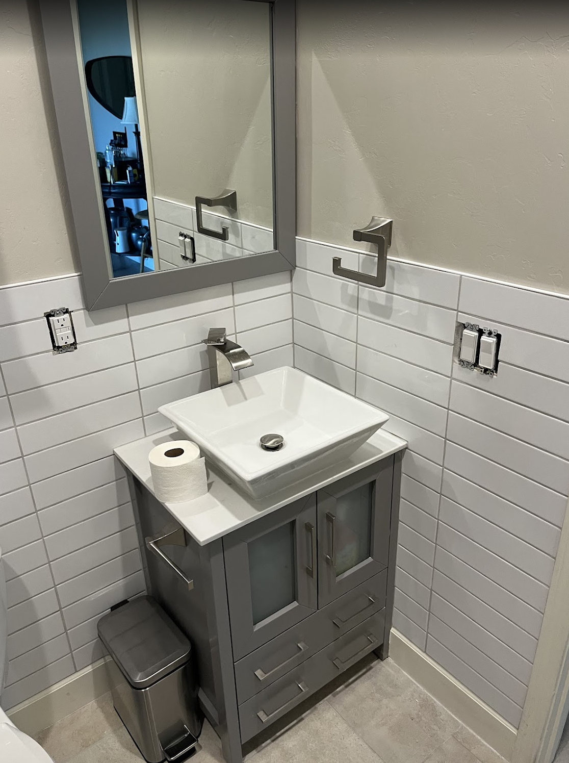 Custom bathroom vanity and tile wall installed by Tile By Nic in Tucson, AZ