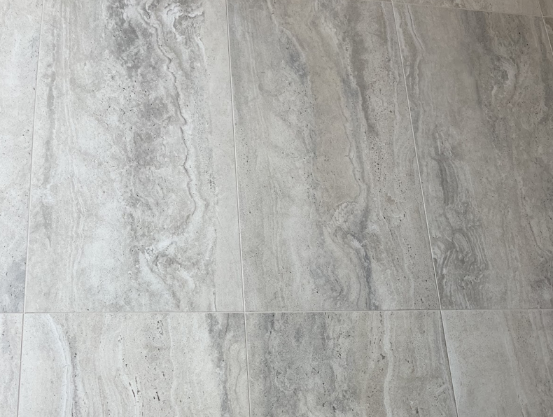 Large-format floor tile installation by Tile By Nic in Tucson, AZ