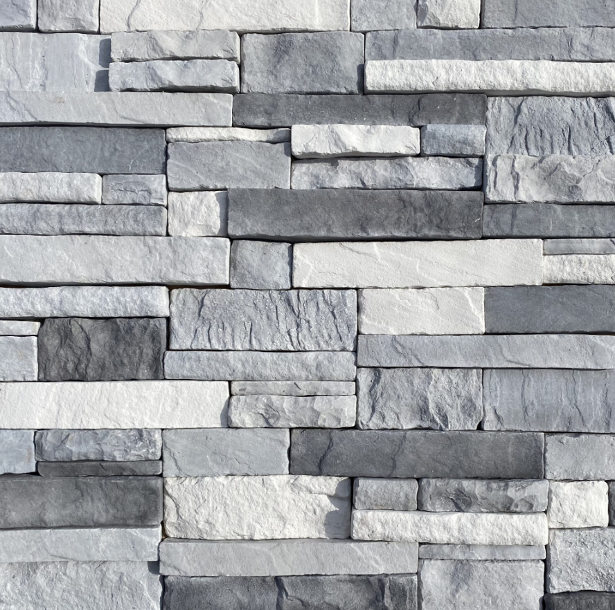 Stacked stone ledger tile used in fireplace installations by Tile By Nic