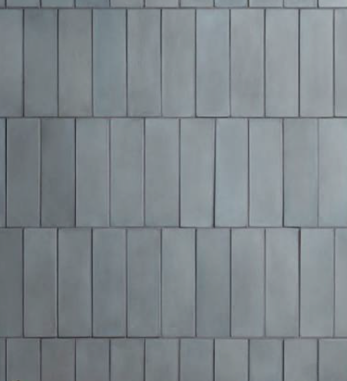 Blue-gray subway tile used in kitchen backsplash installations by Tile By Nic